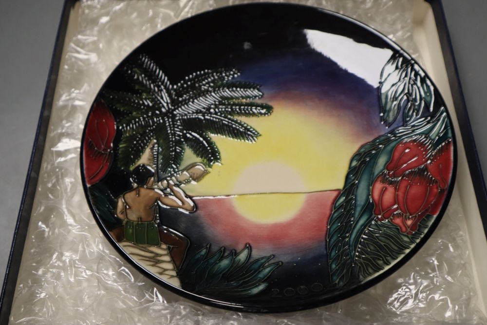 A Moorcroft 2000 year plate, Birth of Light, designed by Nicola Slaney and Wendy Mason, limited edition number 368 of 2000, 23cms d